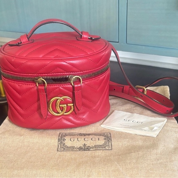 Gucci Handbags - Gucci Red Quilted Leather Vanity Bag with Gold GG Hardware
